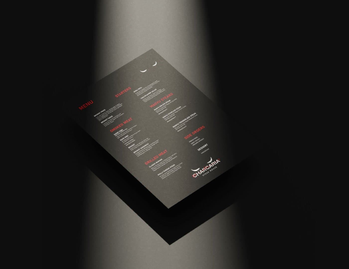 Premium steakhouse menu design featuring dark textured styling, red section headings, white typography, and branded visual elements.